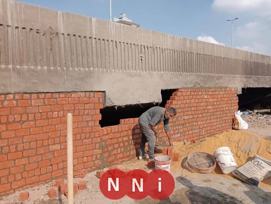 إغلاق الفراغات أسفل الدائري الجنوبي في حي الطالبية بالجيزة لتعزيز الأمان والراحة