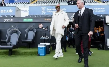 لماذا اجتمع مودريتش وسنوب دوغ في ملعب سوانزي سيتي؟ اكتشف السبب الآن